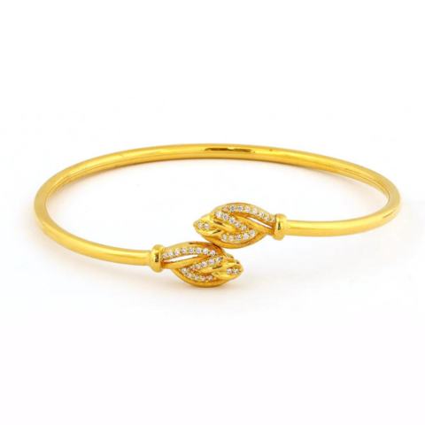 7 Daily Use Gold Bangles for Women You Should Buy 5 Gemstone Studded Gold Bangle